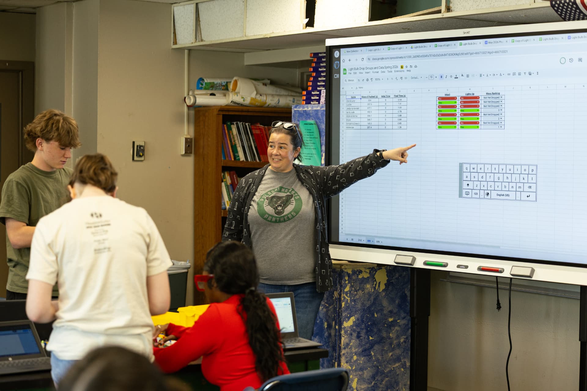 A PHMS teacher leading students through a classroom activity