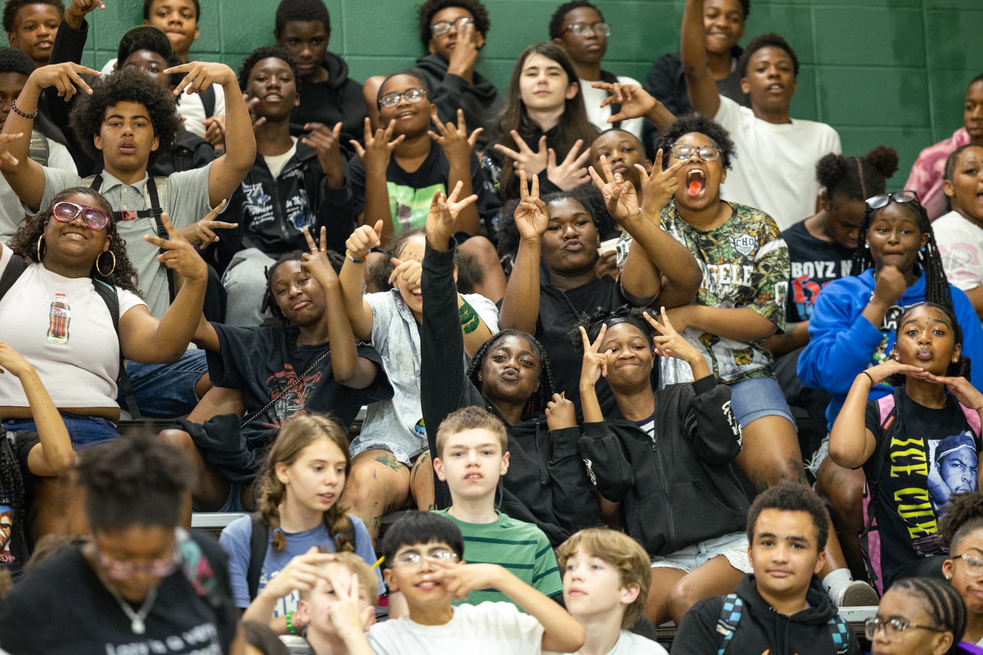 PHMS students cheering together in the gym