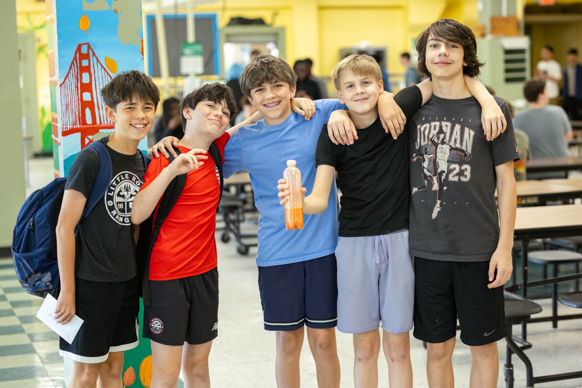 A group of PHMS students together in the school commons